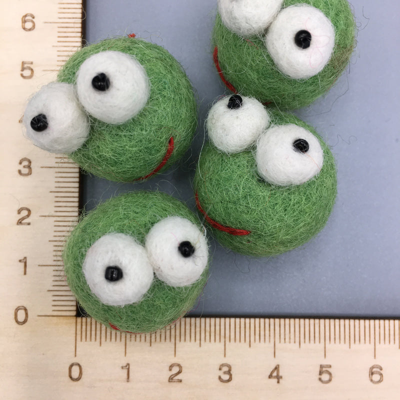 Felted sew on frog